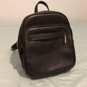 Mini black leather backpack